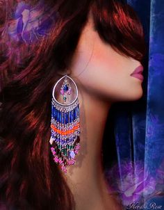 "This pair of Exotic Colorful Beaded Boho Chandelier Earrings is made with Cobalt Blue, Bright Orange, Violet, Hot Pink and Emerald Green glass beads and plated metals. The hoop frames a decorated blue crystal teardrop bead. The beaded strands flare out into metal dangle charms and pink glass beads. Available with Posts, Clip-Ons or French Wires. -6\" Long x 1 1/2\" Wide -0.5 oz. ea. -Free shipping! (Domestic) If you like this design you may also like these: https://www.etsy.com/listing/47566421 Boho Chandelier, Beaded Chandelier Earrings, Beaded Chandelier, Indian Bollywood, Teardrop Beads, French Wire, Dangle Charms, Pink Glass, Blue Crystals