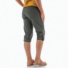 When you need flexibility for your warm-weather days, look no further than the Delmar Crop Pant which features a rollable inseam that can be secured with a tab. Start the cooler summer mornings with the pants unrolled, offering 24" of coverage. As the day warms, roll the Delmar up for a comfortable 17" inseam. Whichever length is right for you, you can be ensured breathability, stretch, fit, and comfort, from an optimal balance of organic cotton and spandex, all wrapped in a peached weave that p Casual Pants For Outdoor Activities In Summer, Casual Bottoms With Elastic Waistband For Warm Weather, Summer Cotton Bottoms For Outdoor, Spring Travel Pants With Elastic Waistband, Spring Cotton Bottoms For Outdoor Activities, Summer Outdoor Pants With Hip Pockets, Summer Pants With Hip Pockets For Outdoor Activities, Cotton Summer Bottoms For Outdoor Activities, Summer Cotton Bottoms For Outdoor Activities