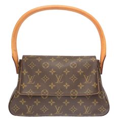 AUTHENTIC LOUIS VUITTON M51147 Monogram Mini Looping Hand Bag 0347 Description Store Item No. 3J0347PB5 Brand LOUIS VUITTON Type Mini Looping/Monogram Model No. M51147 Code MI0041 Country of Manufacture France Production year 2001 Size(CM) W28cm x H16cm x D9cm Handle:52cm Size(Inch) W11.0 x H6.3 x D3.5inch Handle:20.5inch Color Brown Metal Colur Gold Material MonogramCanvasxMonogramCanvas Style Hand Bag come with None Spec [Inside] Zipper pocket x 1 Condition Total ABrank There are Stain / Scrap 70s Fashion Pictures, Monogram Models, Cute Bags, Sell Items, Women's Bags, Hand Bag, Luxury Items, Monogram Canvas, Authentic Louis Vuitton