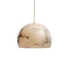 a white marble light hanging from a ceiling