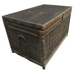 an old wicker trunk is shown on a white background