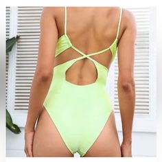 Brand New With Tags. Xl But Fits Like A Large!!! In Package With Hygenic Liner Still Attached. You Can Never Go Wrong With Neon For The Summer! This Neon Green One-Piece Swimsuit Features A Plunging V-Neckline, Strappy Back Forming Cutouts, Cami Straps, And A Cheeky High-Leg Cut. Features: One Piece Plunge Cross Back Straps Removable Soft Cups Lace Up Cutout Paneling Shiny/Lurex Cutout Classic-Standard Coverage Classic-Standard Leg Pattern: Solid, Neon Green Regular Wash Materials: 80% Nylon, 20 Trendy Green Summer Bodysuit, Chic Green Bodysuit For Beach Season, Trendy Stretch Bodysuit For Beach, Trendy One-piece Bodysuit For Vacation, Green Lined Bodysuit For Vacation, Trendy Stretch Bodysuit For The Beach, Trendy Green Bodysuit For The Beach, Casual Green Bodysuit For Beach Season, Chic Green Bodysuit For Pool