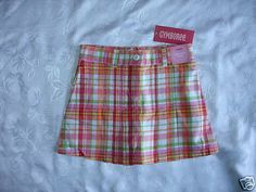 Cute girls skirt with built in shorts underneath from the Gymboree Cherry Baby line. It is Size 4, has an adjustable waist, and is New With Tags. Cherry Baby, Girls Skirt, Baby Skirt, Cheer Skirts, Built In, Cherry, Size 4, Plaid, Skirt