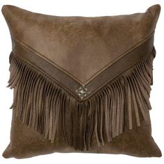 a brown pillow with fringes on it