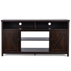 an entertainment center with sliding doors on the top and bottom shelf, in dark wood