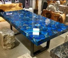 a table that has some blue glass on it