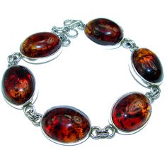 Handmade Unique 925 Sterling Silver bracelet with unique one of a kind Amber,  33.50 grams of marvelous handcrafted jewelry design. Only one piece availble ready to ship! It's unique worldwide bracelet - simply piece of art in world of fine jewelry. HUGE Beautiful  Amber .925 Sterling Silver handcrafted  Bracelet  BRACELET DETAILS: Weight: 33.50g; Material: Sterling Silver; Main stone: Amber; Width (widest section): 3/4 inch; Inner circumference: 8 1/4 inch; Clasp: Lobster-claw labs; Stamp / Mar Unique Polished Sterling Silver Bracelet, Unique Sterling Silver Cuff Bracelet, Oval Handmade Bracelets For Gifts, Unique Handmade Sterling Silver Bracelet As A Gift, Unique Sterling Silver Bracelet For Gift, Unique Handmade Bracelets For Formal Occasions, Unique Handmade Formal Bracelets, Handmade Artisan Sterling Silver Bracelet As Gift, Unique Nickel-free Sterling Silver Bracelet