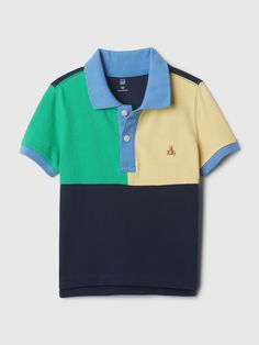 Soft knit pique polo shirt.  Spread collar, button placket.  Short sleeves.  Embroidered Brannan Bear at chest.  Hits at the hip.  Sizes range from baby to toddler. Preppy Polo Shirt With Polo Collar For Summer, Preppy Summer Polo Shirt With Polo Collar, Preppy Short Sleeve Polo Shirt For Summer, Preppy Short Sleeve Summer Polo Shirt, Fitted Color Block Polo Shirt, Blue Collared Polo Shirt Preppy Style, Summer Short Sleeve Color Block Polo Shirt, Preppy Blue Collared Polo Shirt, Summer Color Block Short Sleeve Polo Shirt