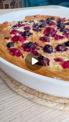 the berry crinkle pie is ready to be baked in the oven and served