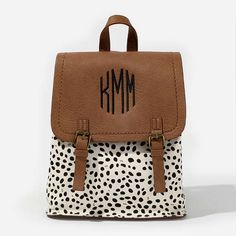 Keep up with all of your essentials with this convenient and cute Monogrammed Backpack Purse! Made of faux leather with front flap buckles, this backpack has two adjustable straps to fit comfortably. Check out our entire selection of monogrammed backpacks and monogrammed tote bags for more options!Made of Faux Leather​ with Brushed Polyester liningMeasures 11 by 9 by 4.75 inchesIncludes an inner top zip, interior zipper pocket and two open pocketsPlease note buckles are decorative Dro School Backpack With Adjustable Straps In Faux Leather, School Backpack With Adjustable Strap And Faux Leather, Cute Leather Backpack With Adjustable Strap, Casual Leather Crossbody Backpack For School, Faux Leather Backpack With Adjustable Strap, Cute Leather Backpack, White Bags With Buckle Closure For Everyday Use, Cute Everyday Backpack With Adjustable Strap, Cute Crossbody Backpack With Adjustable Strap