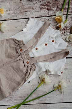 Boy's linen wedding or christening suit: set of linen pants and white linen shirt. The linen clothes are comfortable to wear, because of their softness and absorbency. Qualities of this boy's ring bearer suit: - made from Oeko-Tex certified 100 % European linen fabric which guarantees you that it meets human - ecological requirements. The linen fabric is of medium weight (185 g). Linen is a gorgeous and comfortable nature fabric made from the fibers of the flax plant. It grows softer with age. - Boys Linen Pants, Boys Linen Shirt, Boy Ring, Ring Bearer Suit, First Birthday Boy, Baby Boy Pants, Linen Shirts Women, White Linen Shirt, Cropped Linen Pants