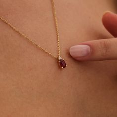 "Gold Ruby Drop Necklace, 14k July Birthstone Gift, Red Gemstone Pendant, Delicate Ruby Cut Necklace, Dainty Ruby, Gold Ruby Jewelry Designed carefully, which will brighten your neck. Our model is quite suitable for everyday use as well as your special day, makes a strong impression with its design, is as stylish as it is ambitious.   All of our products has the stamp \"585\" on them. (which states that this is real gold) Our product weighs 2.57 gr and the chain length is 42 cm. There may be +/- Dainty Red Jewelry, July Birthstone Necklace, Small Ruby Necklace, Real Gemstone Jewelry, Dainty Ruby Jewelry, Gold Necklace Pendant Design, Red Ruby Jewelry, Ruby Gold Jewellery, Gold And Ruby Jewelry