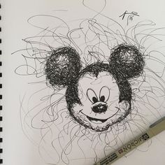 a drawing of a mickey mouse with some writing on it