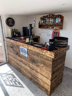 a small bar made out of pallets and wood