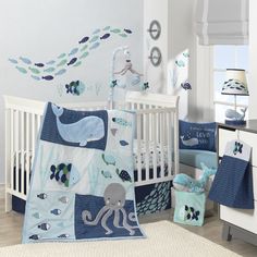 a baby crib bedding set with an octopus theme