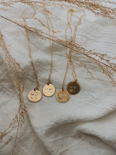 16mm hand stamped brass pendant on a 14k gold filled chain made by me.  This piece can be customized with however many hearts needed for your sisters. A different heart will be filled on each necklace to symbolize that sister/best friend.  Comes in a small black box. Brass will age and patina with time, a small polishing cloth will come with each necklace and will help keep it shiny if wanted!  Please message me with any special requests ☺️ Hand Stamped Round Pendant Necklace For Best Friend, Gold Heart Charm Necklace For Best Friend, Gold Heart Charm Necklaces For Friendship, Handmade Gold Charm Necklaces For Best Friend, Handmade Gold Charm Necklace For Best Friend, Cute Gold Friendship Necklace, Dainty Hand Stamped Necklaces For Best Friend Gift, Hand Stamped Gold Necklace For Best Friend, Gold Heart Necklace For Mother's Day Friendship