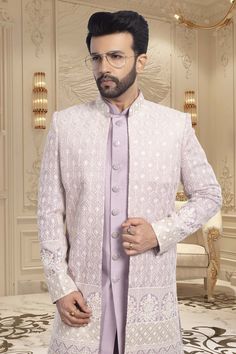 Introducing U2-S353 Men's Sherwani, a modern take on traditional style. This open jacket pastel sherwani boasts intricate thread embroidery, elevating its sophistication and luxury appeal. Make a statement at any special occasion with this exclusive piece. Pastel Sherwani, Mens Sherwani, Open Jacket, Thread Embroidery, Traditional Style, Special Occasion, Thread, Pastel, Embroidery