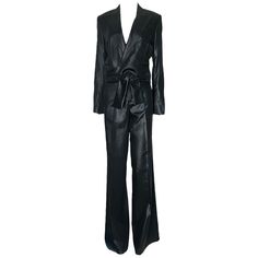 STUNNING GUCCI TAILORED PANT SUIT FROM TOM FORD'S FOR GUCCI A Gucci by Tom Ford pants suit Stunning piece consisting of pants and jacket Made out of finest shiny fabric with hand-stiched details Wrap-style jacket Real opening button on sleeve Wide leg pants, still unhemmed Made in Italy Dry Clean Only Size 40 Never worn, tags still attached Luxury Long Sleeve Fall Pantsuit, Luxury Long Sleeve Pantsuit For Fall, Full-length Pantsuit For Night Out In Fall, Fall Full-length Pantsuit For Night Out, Full Length Pantsuit For Night Out In Fall, Chic Full Length Suits For Fall, Chic Full-length Fall Suits, Chic Full Length Fall Suits, Tom Ford Pants