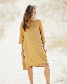 "Soft linen dress. Maternity dress. Mustard dress. Fitting flare dress. Plus size dress. Smock dress. Linen tunic. Linen dresses for women. Mustard soft linen fitting flare dress. Eco organic plus size day dress. Custom color maternity smock dress. Loose sundress with a deep side pockets, 3/4 sleeves dress, Flax Dress with a pleat in the back. Tunic dress. Perfect as maternity dress. The dress is exceptionally comfortable and soft, made from prewashed and softened medium weight natural Lithuania Beach A-line Shift Dress, Flowy Tunic Midi Dress For Daywear, Elegant Linen Dress With 3/4 Sleeves, Beach Tunic Shift Dress, Knee-length Long Sleeve Summer Dress, Beach Shift Dress Midi Length, Beige 3/4 Sleeve Dress For Beach, Flowy Linen A-line Dress, Flowy 3/4 Sleeve Dresses For Daywear