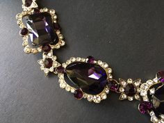 "Featuring clear/pink rhinestones crystals and purple glass stones and linked to cable chain. Just elegant and romantic!! Color: antiqued brass with clear/pink rhinestones crystals and purple glass stones Size: necklace measures around 21\" long x 1.15\" width x 2.5 center drop ** Please note we need to take around 5 days to make it. Please be patient. ** Item ship out with tracking number to you (around 10 to 14 business days for delivery). We also provide fast shipping service, around 3-4 busi Purple Stone Necklace, Amethyst Crystal Necklace, Necklace Wedding, Jewelry Bridal, Amethyst Jewelry, Purple Stones, Amethyst Necklace, Purple Glass, Pink Rhinestones