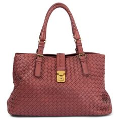 100% authentic Bottega Veneta Medium Roma Tote Bag in burgundy signature Intrecciato nappa leather. Featuring round top handles and a fold-over top with gold-tone push-lock closure. Interior is divided in three compartments. Lined in pale coral suede with one zipper pocket against the back. Has been carried with soft wear to the corners and some faint marks on the lining. Overall in excellent condition. Comes with dust bag. Measurements Height 26cm (10.1in) Width 38cm (14.8in) Depth 20cm (7.8in) Designer Burgundy Shoulder Bag With Double Handle, Luxury Leather Satchel With Intrecciato Weave, Designer Burgundy Leather Bags, Luxury Satchel Bag With Intrecciato Weave, Luxury Intrecciato Weave Satchel For Daily Use, Luxury Satchel With Intrecciato Weave For Daily Use, Luxury Satchel With Intrecciato Weave As Shoulder Bag, Formal Satchel Bag With Intrecciato Weave, Luxury Burgundy Tote Satchel