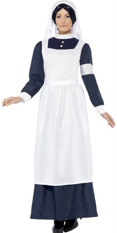 a woman in a nun costume standing with her arms out and hands out to the side