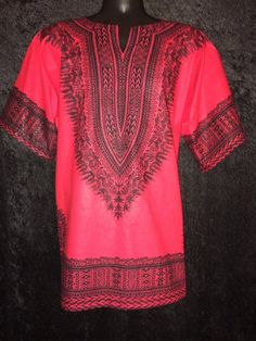 This Dark Red & Black Dashiki top is available for Adult Small, Medium, & Large and Youth Medium, Large and XL Please contact us for additional colors and options or to customize an order by adding fringes, pockets etc. Traditional Black Tops For Vacation, Traditional Red Tops For Festival, Traditional Red Top With Short Sleeves, Red Short Sleeve Tunic For Summer, Red Cotton Kaftan For Festival, Traditional Red Blouse For Vacation, Traditional Red Blouse For Beach, Traditional Red Beach Blouse, Red Tunic Blouse For Festival