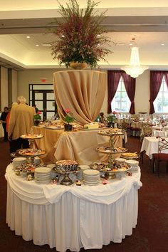 a banquet table with many plates on it