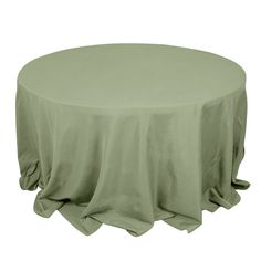 a round table with a green cloth on it