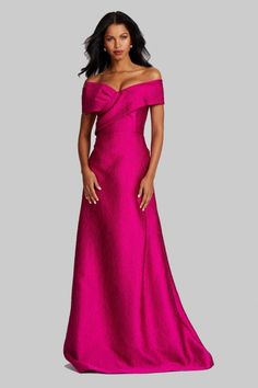 a woman in a bright pink gown