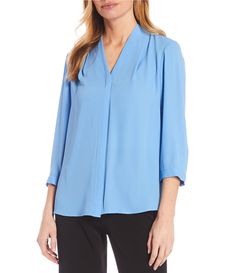 From Investments Petite, this blouse features:v-neckline 3/4 sleeveshidden button front closurepolyestermachine wash/tumble dry Imported. Versatile 3/4 Sleeve Workwear Blouse, Versatile 3/4 Sleeve Blouse For Work, Versatile 3/4 Sleeve Tops For Work, 3/4 Sleeve Blouse For Workwear, Elegant Top With 3/4 Sleeves And Button Closure, Elegant 3/4 Sleeve Top With Button Closure, Spring Workwear Split Neck V-neck Top, Spring Split Neck V-neck Top For Work, Split Neck V-neck Top For Spring Workwear