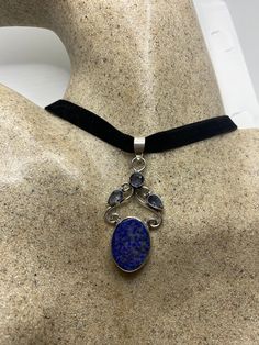 Gorgeous and delicate hand made silver and necklace Genuine lapis LOW CONTENT SILVER NOT 925 Hangs on a velvet ribbon can be on a chain. All jewelry is shipped in a nice gift box. Check out our over a THOUSAND great reviews Ribbon Choker Necklace, Black Velvet Ribbon, Choker Black, Heart Choker, Real Turquoise, Ribbon Necklace, Black Choker, Native American Fashion, Blue Lapis