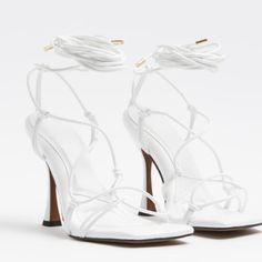 Brand New River Island White Strappy Heeled Sandles. Us Size 8, Uk Size 6. Come With Box. No Wear Or Tear Just To Big For Me. Trendy White High Heel Lace-up Sandals, Trendy White Ankle Strap Lace-up Sandals, Summer Lace-up Sandals With 4-inch Heeled Pointed Toe, Summer Lace-up Sandals With 4-inch Heel And Pointed Toe, Chic Lace-up Sandals With 4-inch Heel For Summer, White Open Toe Lace-up Sandals With Padded Heel, White Lace-up Sandals With Padded Heel And Open Toe, White High Heel Lace-up Sandals, White Lace-up Sandals With Ankle Strap And Padded Heel