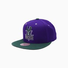 Overview: Mitchell & Ness Milwaukee Bucks NBA Reload Snapback Hat features polyester wool crown and top visor, contrast under visor, raised and flat embroidery front logo & snap closure. Features: Material: 100% Polyester Wool Color: PURPLE Style: 6HSSJS19207-MBUPURP Throwback Streetwear Baseball Cap With Visor, Throwback Streetwear Baseball Cap, Collegiate Snapback Hat With Curved Visor, Collegiate Snapback Hat With Curved Visor For Streetwear, Collegiate Streetwear Snapback Visor Hat, Team-colored Snapback Hat With Embroidered Logo For Streetwear, Purple Style, Milwaukee Bucks, Purple Fashion