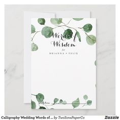 the wedding stationery is shown with eucalyptus leaves