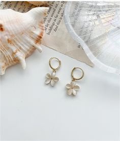 jury Pure Pearl Flower Earring | Earrings for Women | KOODING Flower Shaped Hoop Earrings For Gift, Everyday Spring Earrings, Spring Everyday Earrings, Trendy Flower Earrings For Gift, Spring Flower Drop Earrings For Everyday, Everyday Flower Earrings For Spring, Spring Everyday Flower Shaped Earrings, White Flower Hoop Earrings For Spring, Spring Flower Earrings For Everyday Wear