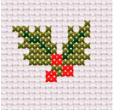 a cross stitch pattern with red bows and green leaves on white fabric, in the shape of an antlers head