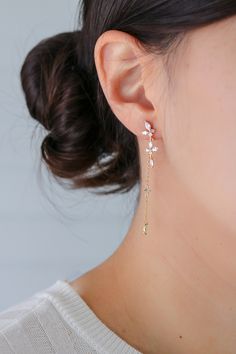 The Sachi Earrings feature a chic array of hanging, marquise and circle crystals. The backings are also finished with a long chain and crystals. Main material:   - 16k Gold/ Rose Gold/ Rhodium Plated, Brass - 92.5 Sterling Silver Post  - Nickel-Free and Lead-Free - Front Length: 25mm  - Back Length: 60mm --------------------------------------------------- Instagram Follow us @statementgrey Bridesmaids Earrings, Wedding Earrings, Pretty Earrings, Bridal Earrings, Bridal Jewelry, Bridesmaids Gifts Wedding Dangle Cluster Earrings, Delicate Linear Earrings For Wedding, Delicate Dangle Cluster Earrings For Wedding, Delicate Cluster Drop Earrings For Wedding, Delicate Drop Cluster Earrings For Wedding, Dainty Drop Bridal Earrings For Party, Delicate Elegant Bridal Earrings For Party, Elegant Linear Drop Earrings For Wedding, Elegant Drop Earrings For Wedding Reception