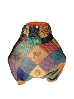 a multicolored patchwork shorts is shown against a white background, with the bottom part showing