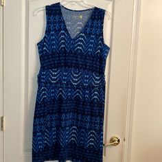 Pretty Shades Of Blue Sleeveless Dress. V Neckline With Elastic Banded Waist. Machine Washable. Size Large Blue Stretch Sleeveless V-neck Dress, Blue Stretch V-neck Sleeveless Dress, Blue Stretch Sleeveless Beach Dress, Blue Stretch Sleeveless Dress For Vacation, Blue Sleeveless Lined Sundress, Sleeveless Blue Lined Sundress, Blue Sleeveless Dress, Ikat Print, Shades Of Blue