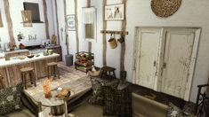 a living room filled with furniture next to a kitchen