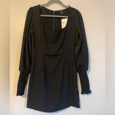 Square Neck Line And Long Sleeve With Elasticized Wrist. Has A Hidden Back Zipper. Waist Measures About 14.5 Inches Across And Dress Is About 31 Inches Long. New With Tags. Originally $22.99 Usd Chic Long Sleeve Mini Dress By Forever 21, Forever 21 Long Sleeve Trendy Mini Dress, Forever 21 Chic Long Sleeve Mini Dress, Forever 21 Fitted Mini Dress For Fall, Forever 21 Long Sleeve Mini Dress For Date Night, Forever 21 Fitted Dresses For Fall, Forever 21 Black Mini Dress For Brunch, Forever 21 Black Mini Dress For Fall, Forever 21 Black Dress For Brunch