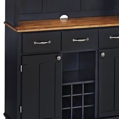 a kitchen island with wine racks and drawers