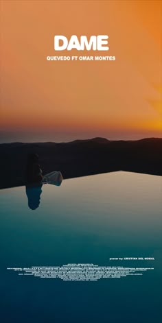 a person sitting on the edge of a pool at sunset with text overlaying it