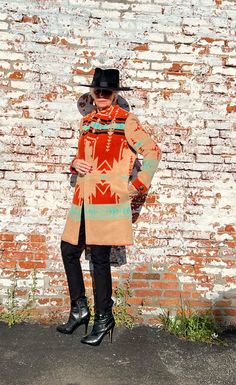 The Halona Jacket  Cuffed Sleeve -  ( Halona Means Happy Fortune)   Style No. HLNA -  JKT - CFF Fabric Color: Terracotta Powder  Sm to Medium 36" to  37"Length  Large   38" Length / ( full width at bottom 71")     * Lightweight,  60% cotton / 30 acrylic / 10 poly woven fleece      * Cuffed Up Sleeve with Button      * Side Pockets or Outside Pockets     * Detailing simply and elegantly done with our signature Blanket Stitching on bottom of jacket and sleeve is all you need.     * Dry Clean      NOTE: For other colors, please message us NOTE: For Sizes XLG to XXLG please  message us for price Fall Outerwear With Shawl Collar And Buttons, Bohemian Winter Outerwear With Button Closure, Vintage Shawl Collar Outerwear For Fall, Bohemian Fall Outerwear With Buttons, Western Style Outerwear With Buttons For Fall, Fall Bohemian Outerwear With Stand Collar, Vintage Winter Coat, Neck Bone, Neck Bones