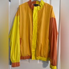 Nwot Bumble Windbreaker. Size Medium. Unisex. Yellow Color Block Outerwear For Spring, Spring Yellow Color Block Outerwear, Retro Yellow Windbreaker For Fall, Trendy Yellow Spring Windbreaker, Retro Yellow Windbreaker For Spring, Long Sleeve Yellow Color Block Outerwear, Retro Yellow Outerwear With Pockets, Vintage Yellow Windbreaker For Winter, 90s Yellow Windbreaker For Winter