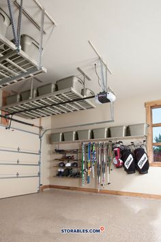 an organized garage with the text 4 steps to organize the garage