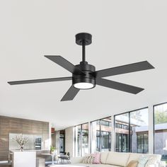 a modern ceiling fan in a living room