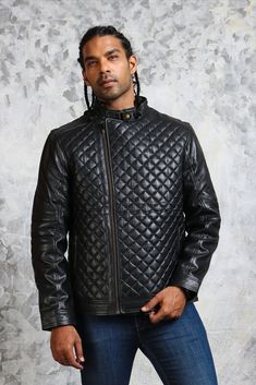 Black leather jacket with diamond quilted pattern made with real leather. This black leather quilted jacket features asymmetric zip closure, two zipper pockets on its exterior with padded sleeves and shoulders. Includes premium viscose lining and snap button collar assuring comfort and warmth. This diamond quilted jacket is one of the most timeless and total head-turner piece which can help you emphasize your casual outfits Quilted Biker Leather Jacket For Winter, Winter Quilted Leather Biker Jacket, Quilted Leather Biker Jacket, Quilted Biker Leather Jacket, Black Quilted Biker Leather Jacket, Fitted Leather Biker Jacket With Quilted Details, Black Quilted Leather Biker Jacket, Fitted Leather Quilted Jacket, Quilted Leather Jacket