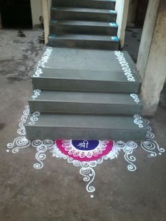 the steps are painted with white chalk and have designs on them